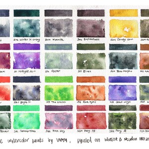 May include: A watercolor paint swatch chart with 24 different colors. The colors are labeled with names like "Ankou", "Midnight Sun", "The Kaiser", and "Blueberry Muffin". The chart is handmade and painted on Winsor & Newton Pro 200g paper.