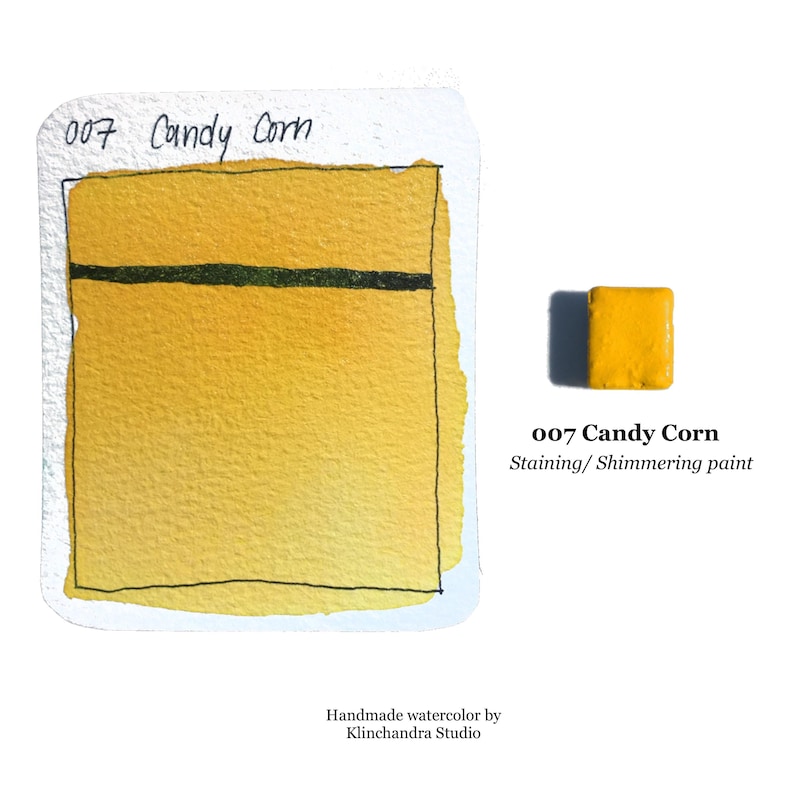 May include: A watercolor paint sample in a yellow color called "Candy Corn". The paint is described as "Staining/Shimmering paint".