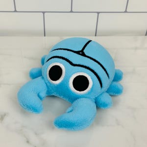 Clippy le coléoptère Frisk Wolfie's Customs, mascotte du scarabée insecte en peluche bleu mignon