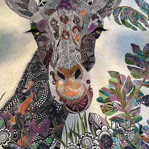 May include: A close-up of a colorful, patterned giraffe quilt. The giraffe's face is prominent, with intricate details in black, white, and purple. The background features a variety of green and purple leaves, as well as black and white flowers.