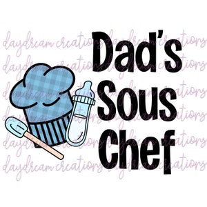 May include: A blue and white checked chef's hat, a baby bottle, and a wooden spatula with a blue handle. The text "Dad's Sous Chef" is in black.
