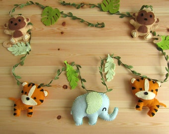 Garland animals of the savannah (tigers, monkeys, elephant) in felt Wall decoration for baby child's room. Birth Birthday