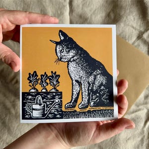 Carte de voeux recyclée en linogravure de jardin de chats