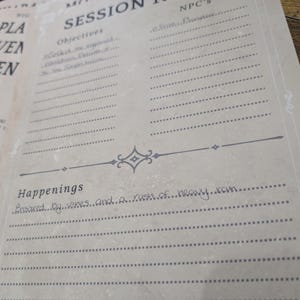May include: A beige session notes page with the title "MONSTERS MET / SESSION NOTES" in black. The page includes sections for objectives, NPC's, and happenings, with handwritten notes about vines and heavy rain.
