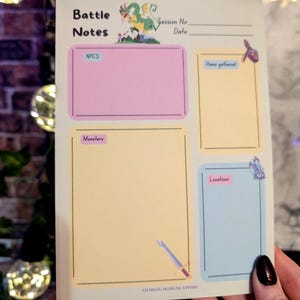 May include: A printable battle notes page with sections for NPCs, monsters, locations, and items gathered. The page features a cartoon dragon and sword.