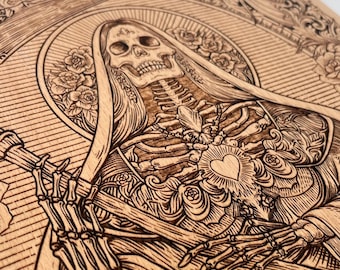 May include: A wood-burned image of a skeleton wearing a robe and holding a heart. The image is surrounded by a decorative frame with the words "Ouija" and "No" at the top.