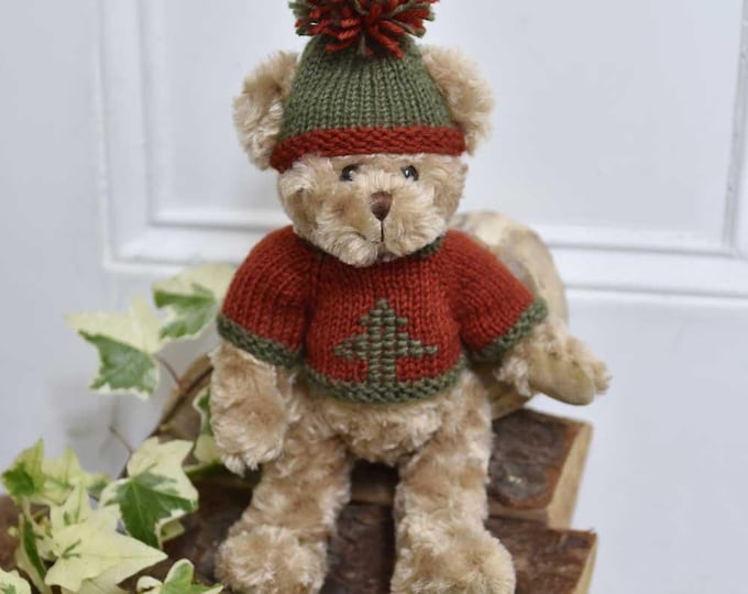 Teddy Wearing Red And Green Hand Knitted Jumper And Cosy Knitted Hat