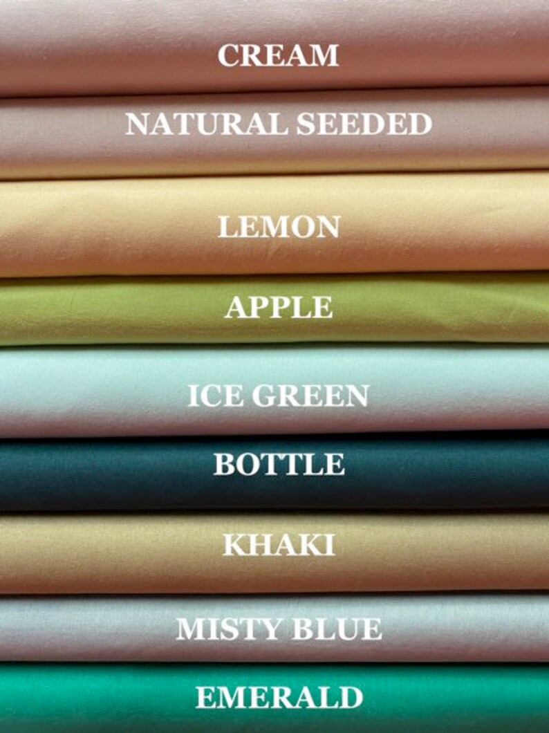 May include: A collection of fabric swatches in various colors, including cream, natural seeded, lemon, apple, ice green, bottle, khaki, misty blue, and emerald.
