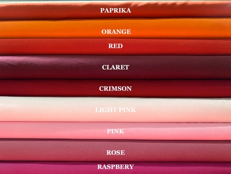 May include: A collection of fabric swatches in various shades of red, orange, and pink. The swatches are labeled with the following names: Paprika, Orange, Red, Claret, Crimson, Light Pink, Pink, Rose, and Raspberry.