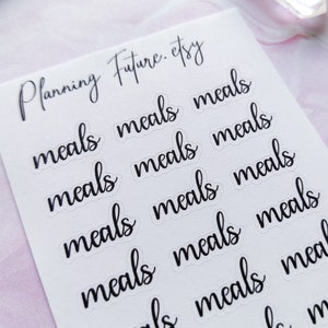 May include: A sheet of white planner stickers featuring the word "meals" in a black, cursive font. The stickers are arranged in rows and columns. The shop name "Planning Future.etsy" is written in a similar font at the top.