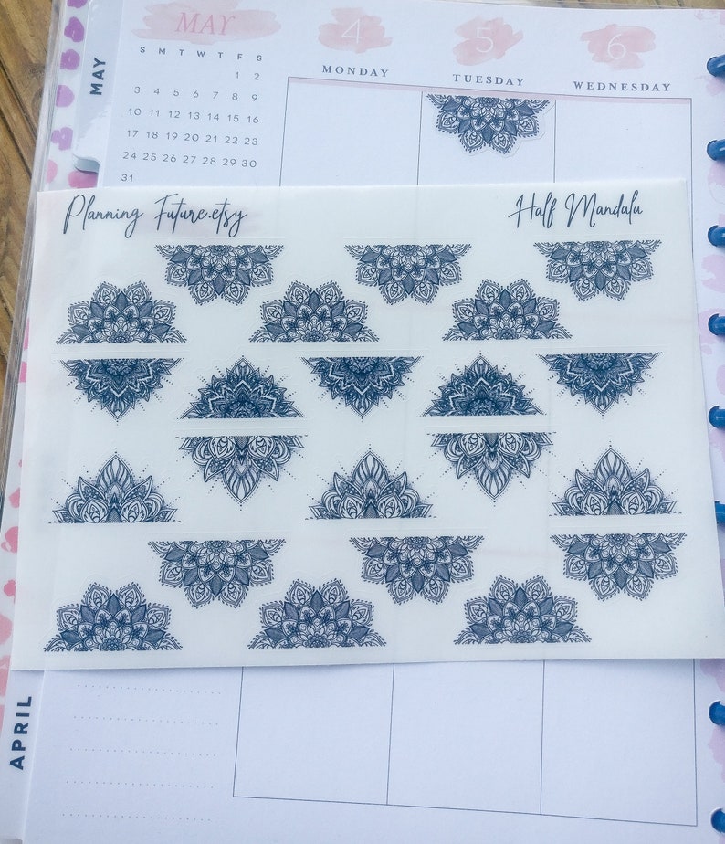 May include: A sheet of stickers with black and white mandala designs. The stickers are arranged in rows and columns. The sheet is labeled "Half Mandala" and "Planning Future.etsy".