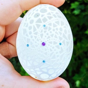 Carved duck egg geometric pattern with amethyst and blue topaz