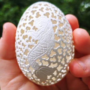 Carved duck egg mermaid