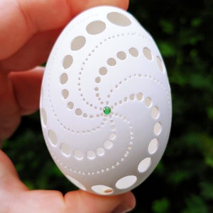 Carved duck egg Swirls with natural Emerald gemstone set in center