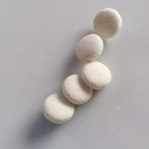 May include: Five off-white, circular fabric-covered buttons arranged diagonally. The buttons have a textured surface and are evenly spaced against a light grey background. The buttons appear to be new.