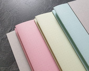 Dotted RGB notebook: 100% recycled paper in 3 colors, DIN A5 (148x210mm), 144 pages, portrait format