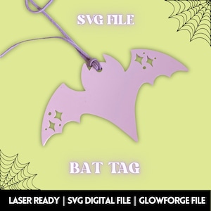 May include: A pink bat-shaped tag with a hole for string. The tag has a cut-out design of stars. The text "BAT TAG" is below the bat and the text "SVG FILE" is above the bat.