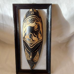 African Chiseled Mask With Lion Design