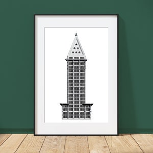 May include: A black and white line drawing of a skyscraper with a pointed roof. The building is framed in a black frame with a white mat.