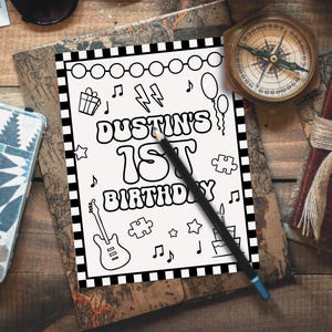 May include: Black and white coloring page with a checkered border. The page says "Dustin's 1st Birthday" with musical notes, a guitar, a puzzle piece, a birthday cake, and stars.