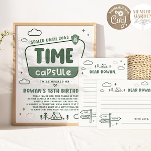 May include: A framed print and two cards with a camping theme. The print reads "TIME capsule" and "Sealed until 2043". The cards say "Dear Rowan" and have lines for writing. The design is in green and white.