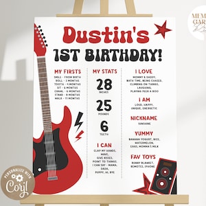 May include: A red and black electric guitar with a lightning bolt graphic. A white poster with the text "Dustin's 1st Birthday!" and details about the child's first year, including height, weight, and favorite things.