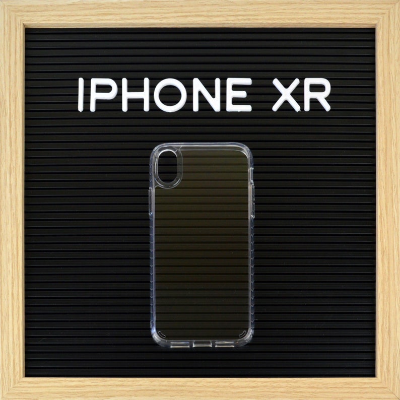 May include: Clear protective phone case for an iPhone XR. The case is transparent, allowing the phone's design to show through. The phone case is on a black background with the words "IPHONE XR" in white letters.