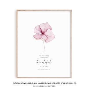May include: A printable art print with a watercolor painting of a pink flower. The print features the quote "He has made everything beautiful in its time." from Ecclesiastes 3:11.