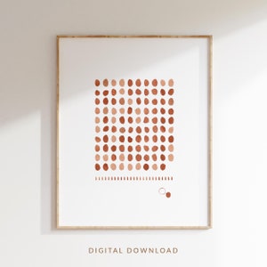 May include: A digital download of a printable art print featuring a geometric pattern of terracotta-coloured circles on a white background. The print has a minimalist aesthetic and would be a great addition to any modern home.