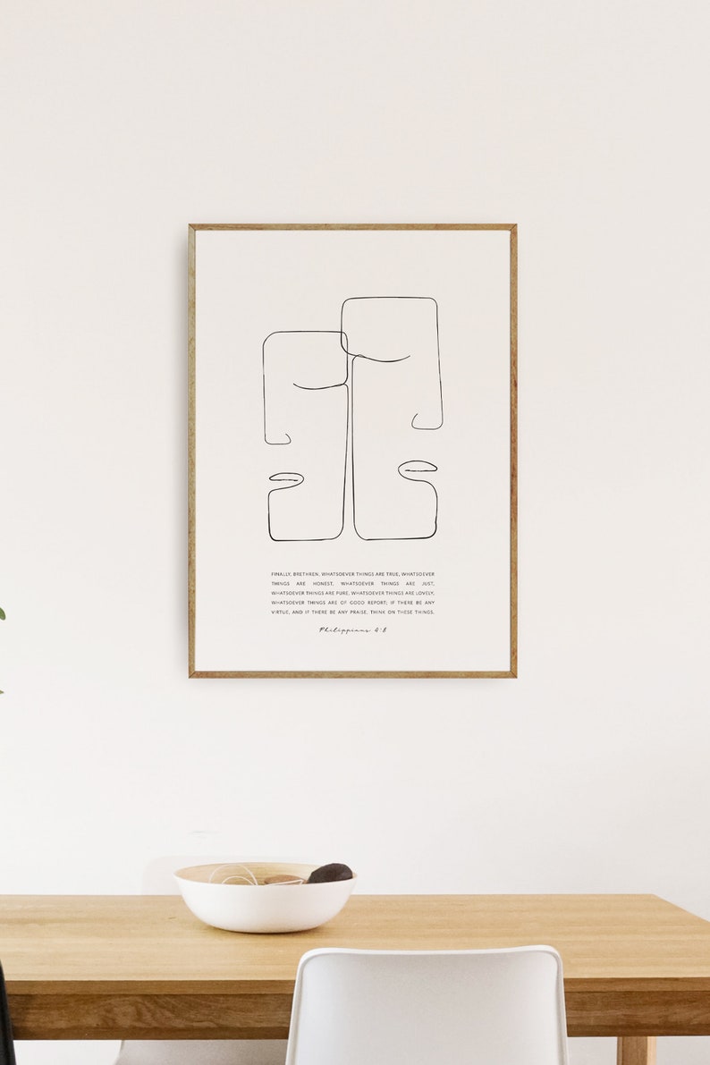 May include: A minimalist line art print of two faces with a quote from Philippians 4:8. The quote reads "Finally, brothers and sisters, whatever is true, whatever is noble, whatever is right, whatever is pure, whatever is lovely, whatever is admirable - if anything is excellent or praiseworthy - think about such things."