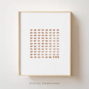 May include: A digital download of a printable art print featuring a geometric pattern of brown watercolor dots on a white background.