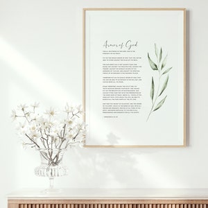 K&ouml;nnte beinhalten: Ein gerahmter Druck mit wei&szlig;em Hintergrund und schwarzem Text. Der Text ist ein Zitat &uuml;ber die R&uuml;stung Gottes aus Epheser 6,10-18. Der Druck ist mit einer Aquarellillustration eines gr&uuml;nen Blattwerks verziert.
