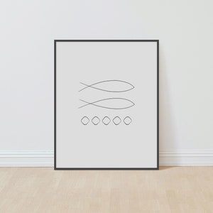 May include: A black framed print with a minimalist design featuring two stylized fish and five circles in a row.