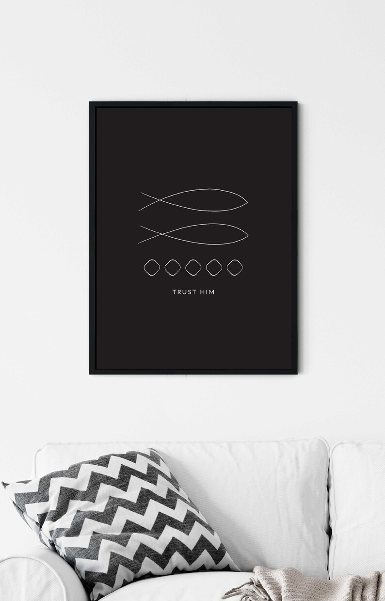 May include: Black and white minimalist art print with two stylized fish symbols and the text "TRUST HIM" in a white sans-serif font.