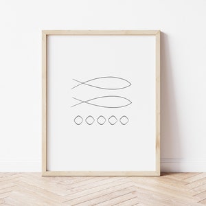 May include: A black and white line art print of two fish symbols and a row of six circles in a wooden frame.