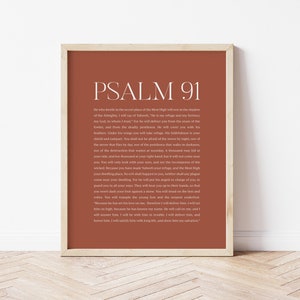 May include: A printable wall art print with a terracotta background featuring Psalm 91 from the Bible. The text is in white and reads "PSALM 91" at the top and continues with the verses of the psalm.