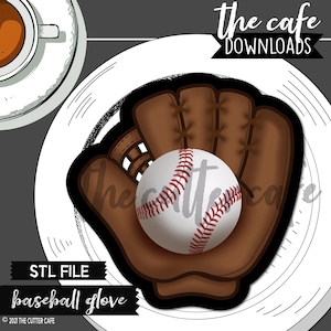 May include: A brown leather baseball glove with white stitching holds a white baseball with red stitching. The glove and ball are on a white plate with black lines around the edge. The text "STL FILE baseball glove" is at the bottom of the image.