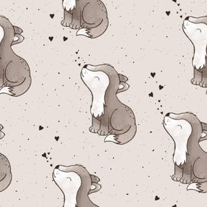 Könnte beinhalten: Ein sich wiederholendes Muster mit Cartoon-Wölfen in Braun- und Weißtönen, mit kleinen schwarzen Herzen, die über einem hellbeige Hintergrund verstreut sind. Die Wölfe sind in sitzender Position dargestellt und blicken nach oben.