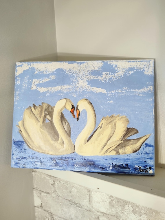 キャンバスに描かれた白鳥の絵画 | 湖畔にハートの首を持つ