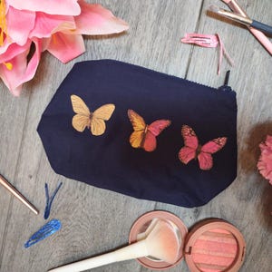 Navy Butterfly Cosmetic Bag | Hand-Painted Butterflies and Moths Makeup Travel Pouch | Handmade Zipper Bag in 100% Cotton with Gray Lining