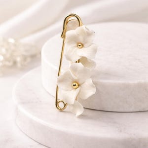 Attache-traîne perles et cristal pour robe de mariée Remonte - France