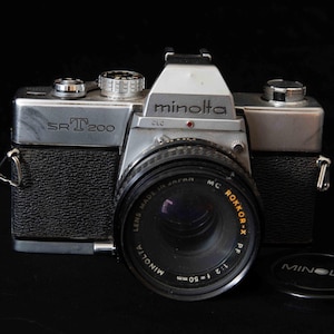 Vintage Minolta SRT 200 with 50mm Lens and lens cap
