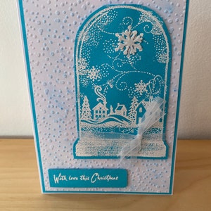 Carte de Noël de globe de neige