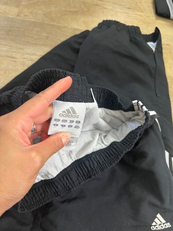 Pants adidas negro con rayas best sale blancas