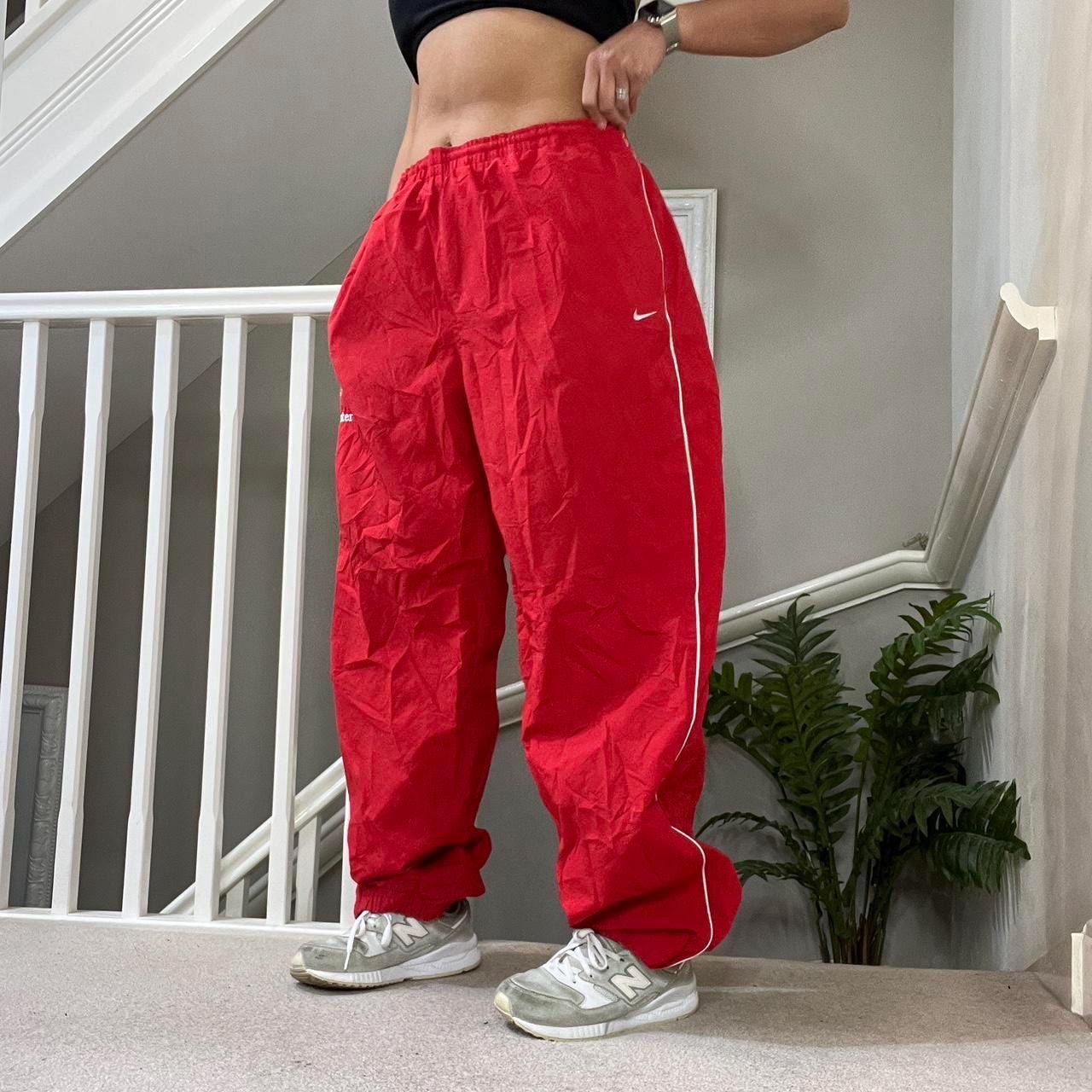 red nike windbreaker pants