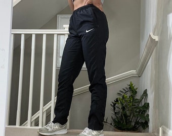 Nike negro Slim Fit cortavientos chándal pantalones de pista inferior tamaño S unisex raro Vintage 00s