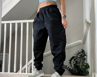 Reebok Pierna con puños ligero Baggy Fit Chándal inferior Pantalones de chándal Tamaño L unisex Rare Vintage 00s negro