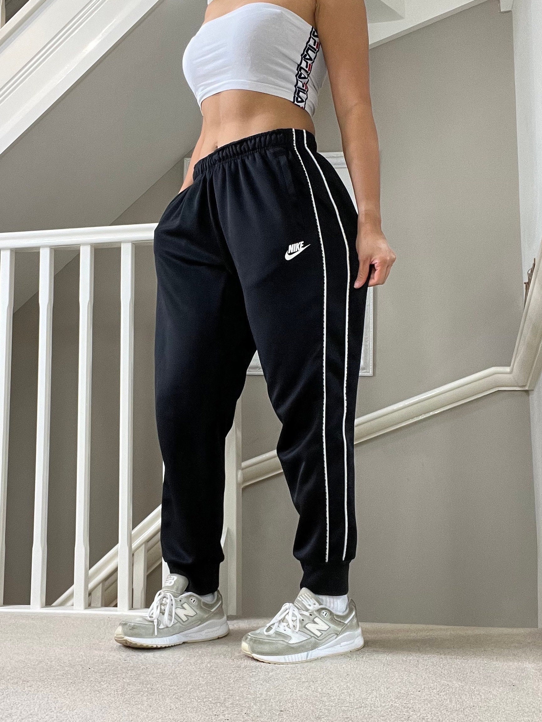 Rare Nike Logo Piping Down the Side Tapered Cuff Leg Black Joggers