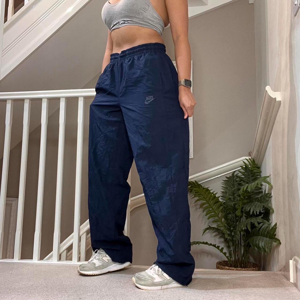 Nike blue track pants clearance