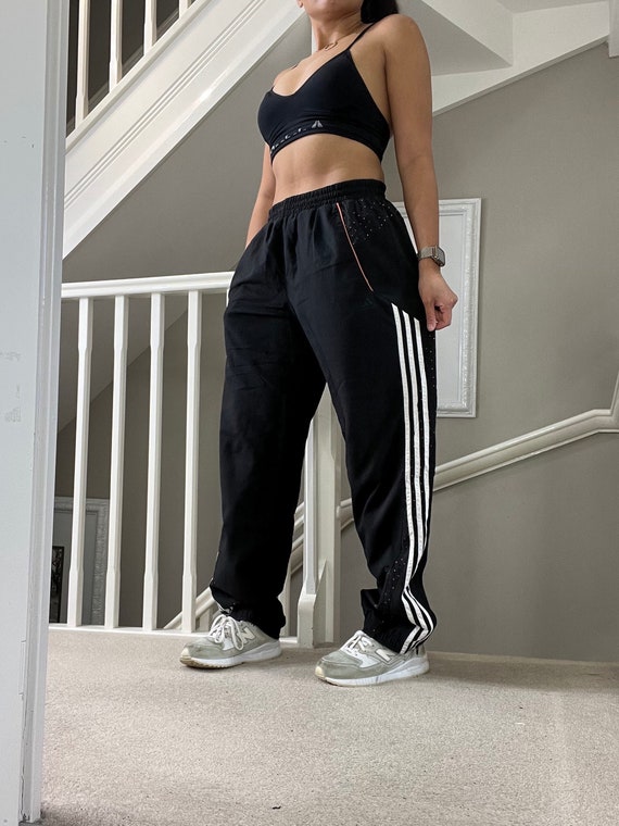 Black tracksuit bottoms white stripe deals